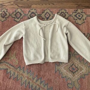 Women’s open cardigan with tie, color is oatmeal/tan, size is S
